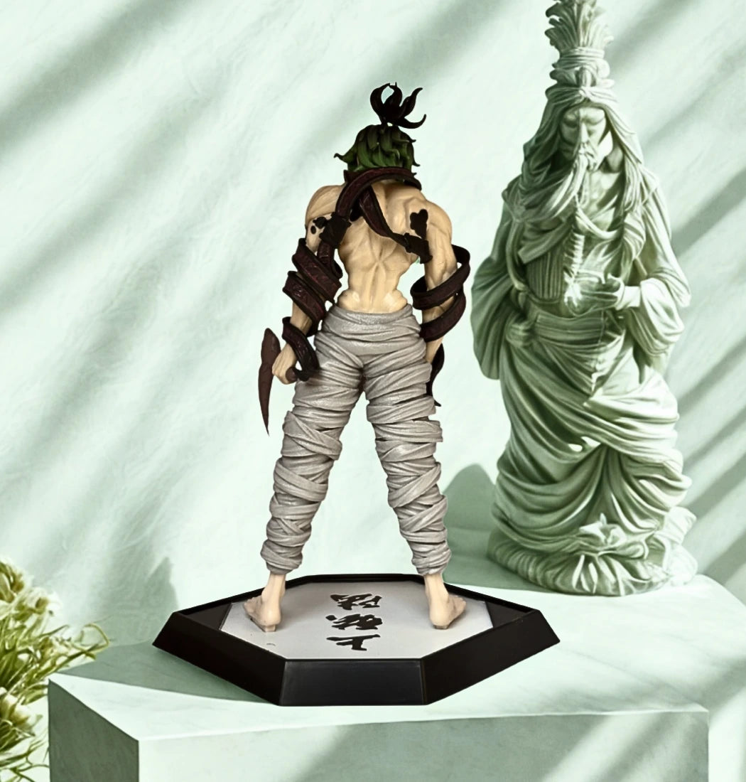 Gyutaro Two figurines on a white surface with a light green background