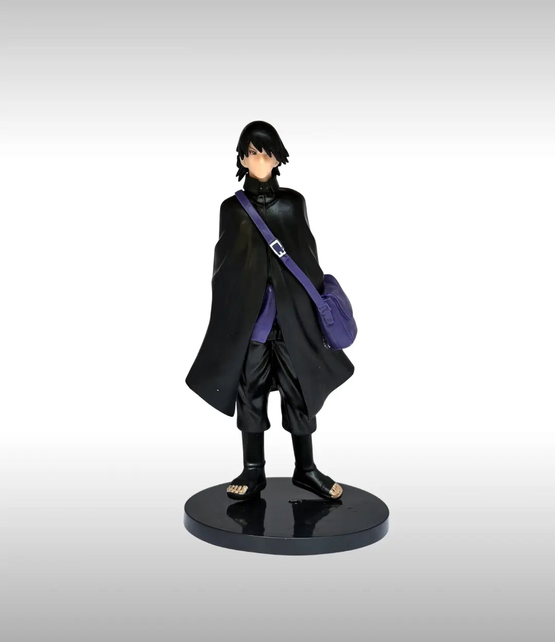 Figurine of a character in a black coat with a purple bag on a gray background